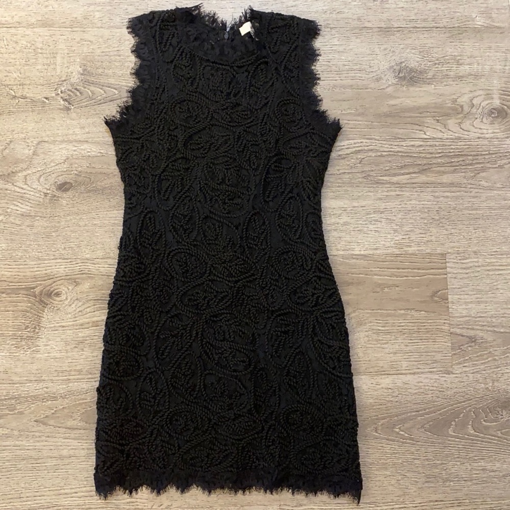 Black sheath cocktail dress with textured pattern